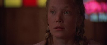 Movie still from “3 Women” (1977), directed by Robert Altman – A person looking at the camera; Close Up shot, Low angle