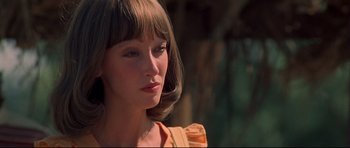 Movie still from “3 Women” (1977), directed by Robert Altman – A person wearing a yellow dress; Close Up shot, Over the shoulder angle