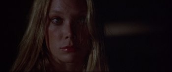 Movie still from “3 Women” (1977), directed by Robert Altman – A person with long hair; Close Up shot, Low angle