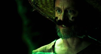 Movie still from “3 from Hell” (2019), directed by Rob Zombie – A person with a hat on; Close Up shot, Low angle