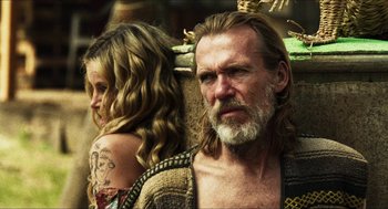 Movie still from “3 from Hell” (2019), directed by Rob Zombie – A man and a woman standing next to each other; Close Up shot, Over the shoulder angle