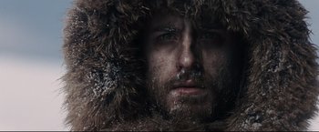 Movie still from “30 Days of Night” (2007), directed by David Slade – A person wearing a fur hat; Extreme Close Up shot, Low angle