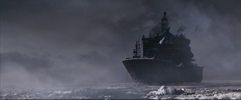 Movie still from “30 Days of Night” (2007), directed by David Slade – A ship in the middle of the ocean in the middle of the night; Extreme Wide shot, Low angle
