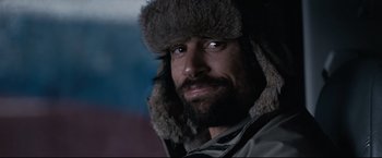 Movie still from “30 Days of Night” (2007), directed by David Slade – A person wearing a fur hat; Close Up shot, Low angle