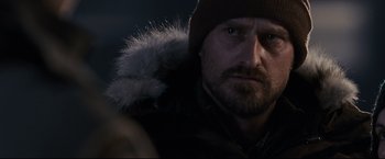 Movie still from “30 Days of Night” (2007), directed by David Slade – A person wearing a jacket; Close Up shot, Over the shoulder angle