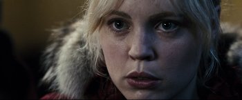 Movie still from “30 Days of Night” (2007), directed by David Slade – A woman's eyes and face; Close Up shot, High angle