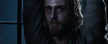 Movie still from “30 Days of Night” (2007), directed by David Slade – A person with a beard; Close Up shot, Low angle