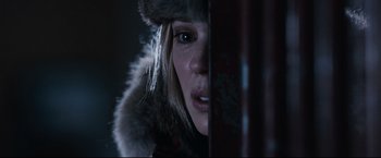 Movie still from “30 Days of Night” (2007), directed by David Slade – A person wearing a fur hat; Close Up shot, Over the shoulder angle