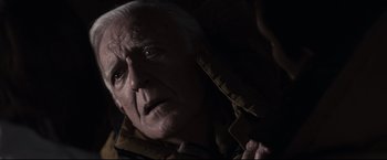 Movie still from “30 Days of Night” (2007), directed by David Slade – An old man with white hair looking at the camera; Close Up shot, Over the shoulder angle