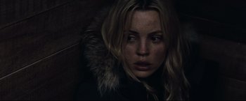 Movie still from “30 Days of Night” (2007), directed by David Slade – A person wearing a jacket; Close Up shot, Over the shoulder angle