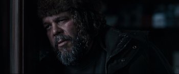 Movie still from “30 Days of Night” (2007), directed by David Slade – A person wearing a fur hat; Close Up shot, Low angle