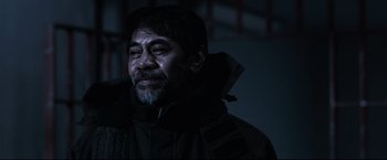 Movie still from “30 Days of Night” (2007), directed by David Slade – A person wearing a jacket; Close Up shot, Over the shoulder angle