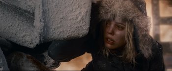 Movie still from “30 Days of Night” (2007), directed by David Slade – A woman in a black jacket and a fur hat; Close Up shot, Low angle