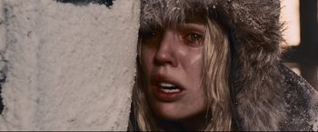 Movie still from “30 Days of Night” (2007), directed by David Slade – A person wearing a fur hat; Close Up shot, Low angle