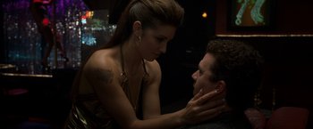 Movie still from “30 Minutes or Less” (2011), directed by Ruben Fleischer – A man and a woman are looking at each other; Close Up shot, High angle