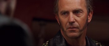Movie still from “3000 Miles to Graceland” (2001), directed by Demian Lichtenstein – A person wearing a chainmail shirt; Close Up shot, Over the shoulder angle