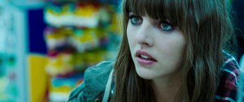 Movie still from “4.3.2.1.” (2010), directed by Mark Davis – A person with blue eyes; Close Up shot, Over the shoulder angle