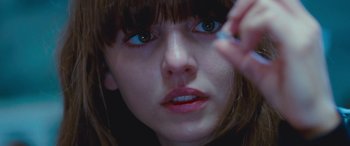 Movie still from “4.3.2.1.” (2010), directed by Mark Davis – A person with blue eyes; Close Up shot, Overhead angle