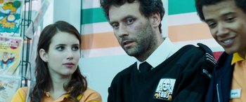 Movie still from “4.3.2.1.” (2010), directed by Mark Davis – A man and a woman standing next to each other; Close Up shot, Over the shoulder angle