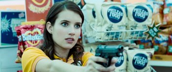 Movie still from “4.3.2.1.” (2010), directed by Mark Davis – A woman is holding a gun in her hand; Close Up shot, Over the shoulder angle