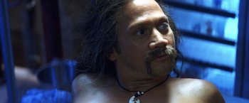 Movie still from “50 First Dates” (2004), directed by Peter Segal – A person wearing a necklace; Close Up shot, High angle