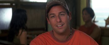 Movie still from “50 First Dates” (2004), directed by Peter Segal – A person wearing a hat; Close Up shot, Over the shoulder angle