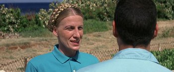 Movie still from “50 First Dates” (2004), directed by Peter Segal – A woman wearing a blue shirt and a braid on her head; Close Up shot, Low angle