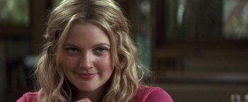 Movie still from “50 First Dates” (2004), directed by Peter Segal – A person with long blonde hair; Close Up shot, Over the shoulder angle