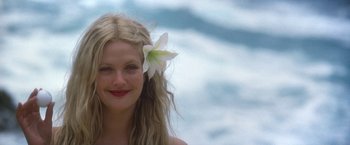 Movie still from “50 First Dates” (2004), directed by Peter Segal – A beautiful woman with a flower in her hair; Close Up shot, Over the shoulder angle