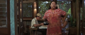 Movie still from “50 First Dates” (2004), directed by Peter Segal – An older man and a woman in a restaurant; Medium shot, Over the shoulder angle