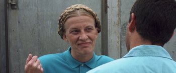 Movie still from “50 First Dates” (2004), directed by Peter Segal – A woman with a blue shirt and a braid on her head; Close Up shot, Low angle