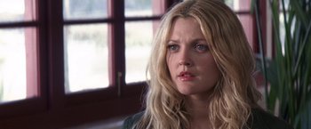 Movie still from “50 First Dates” (2004), directed by Peter Segal – A person with long blonde hair; Close Up shot, Over the shoulder angle