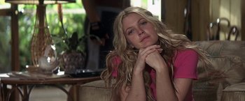 Movie still from “50 First Dates” (2004), directed by Peter Segal – A beautiful blonde woman sitting on a couch; Close Up shot, Low angle