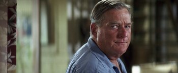 Movie still from “50 First Dates” (2004), directed by Peter Segal – An older man in a blue shirt looking at the camera; Close Up shot, Over the shoulder angle