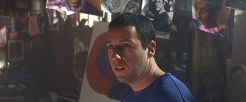 Movie still from “50 First Dates” (2004), directed by Peter Segal – A person in a blue shirt; Close Up shot, Low angle