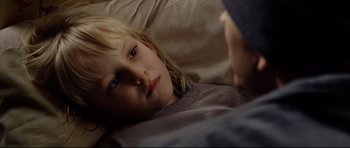 Movie still from “8 Mile” (2002), directed by Curtis Hanson – A little girl laying in a bed with her head on a pillow; Close Up shot, High angle