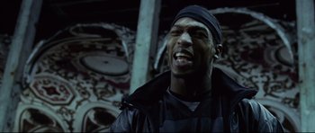 Movie still from “8 Mile” (2002), directed by Curtis Hanson – A person with a hat on; Close Up shot, Low angle