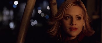 Movie still from “8 Mile” (2002), directed by Curtis Hanson – A person with long blonde hair; Close Up shot, Low angle