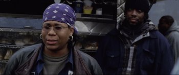 Movie still from “8 Mile” (2002), directed by Curtis Hanson – A woman with a bandana around her head; Close Up shot, Low angle