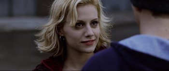 Movie still from “8 Mile” (2002), directed by Curtis Hanson – A person with blonde hair; Close Up shot, Over the shoulder angle