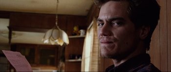 Movie still from “8 Mile” (2002), directed by Curtis Hanson – A person looking at the camera; Close Up shot, Low angle