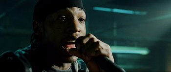 Movie still from “8 Mile” (2002), directed by Curtis Hanson – A person brushing his teeth; Close Up shot, Low angle