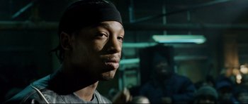 Movie still from “8 Mile” (2002), directed by Curtis Hanson – A person wearing a headband; Close Up shot, Low angle