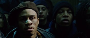 Movie still from “8 Mile” (2002), directed by Curtis Hanson – A group of young men standing next to each other; Close Up shot, Low angle