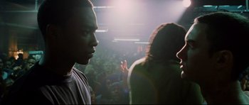 Movie still from “8 Mile” (2002), directed by Curtis Hanson – A man and a woman in front of an audience; Medium shot, Over the shoulder angle