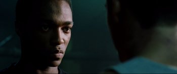Movie still from “8 Mile” (2002), directed by Curtis Hanson – A person looking at another person; Close Up shot, Over the shoulder angle