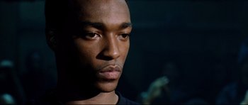 Movie still from “8 Mile” (2002), directed by Curtis Hanson – A man's face in the dark; Close Up shot, Low angle