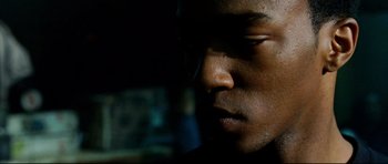 Movie still from “8 Mile” (2002), directed by Curtis Hanson – A man's face in the dark; Close Up shot, Low angle