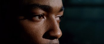 Movie still from “8 Mile” (2002), directed by Curtis Hanson – A person's eyes and face; Extreme Close Up shot, Overhead angle