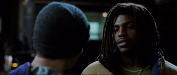 Movie still from “8 Mile” (2002), directed by Curtis Hanson – Two men standing next to each other in a dark room; Close Up shot, Over the shoulder angle